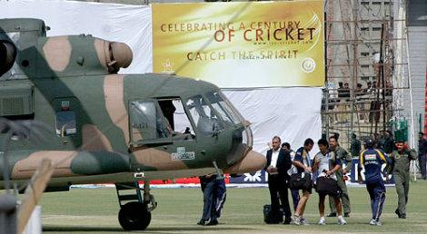 srilanka1 Srilankan players prepare to leave the Gaddafi stadium on a military helicopter