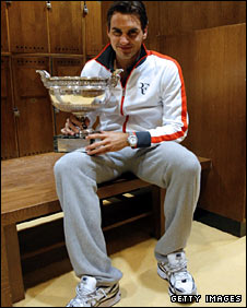 Federer with the French Open trophy after his brilliant win on Sunday